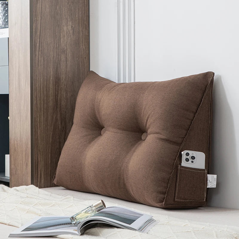 Small triangular wedge pillow with built-in massager from Your Outdoors n' More, designed for comfort and relaxation.