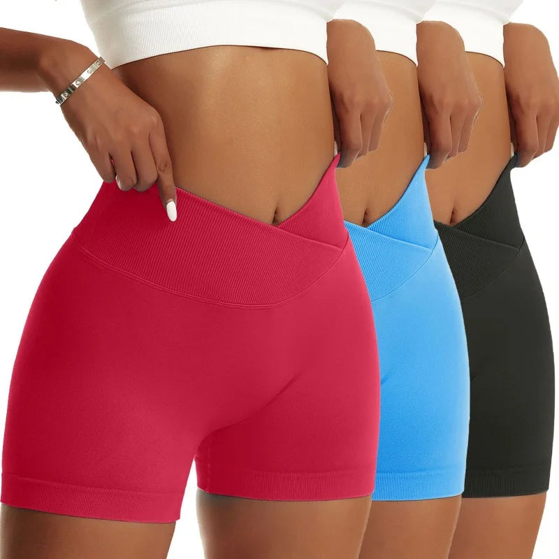 Three women wearing pink, black, and gray sports pants from Your Outdoors n' More, showcasing 3-piece women's hip sports pants set.