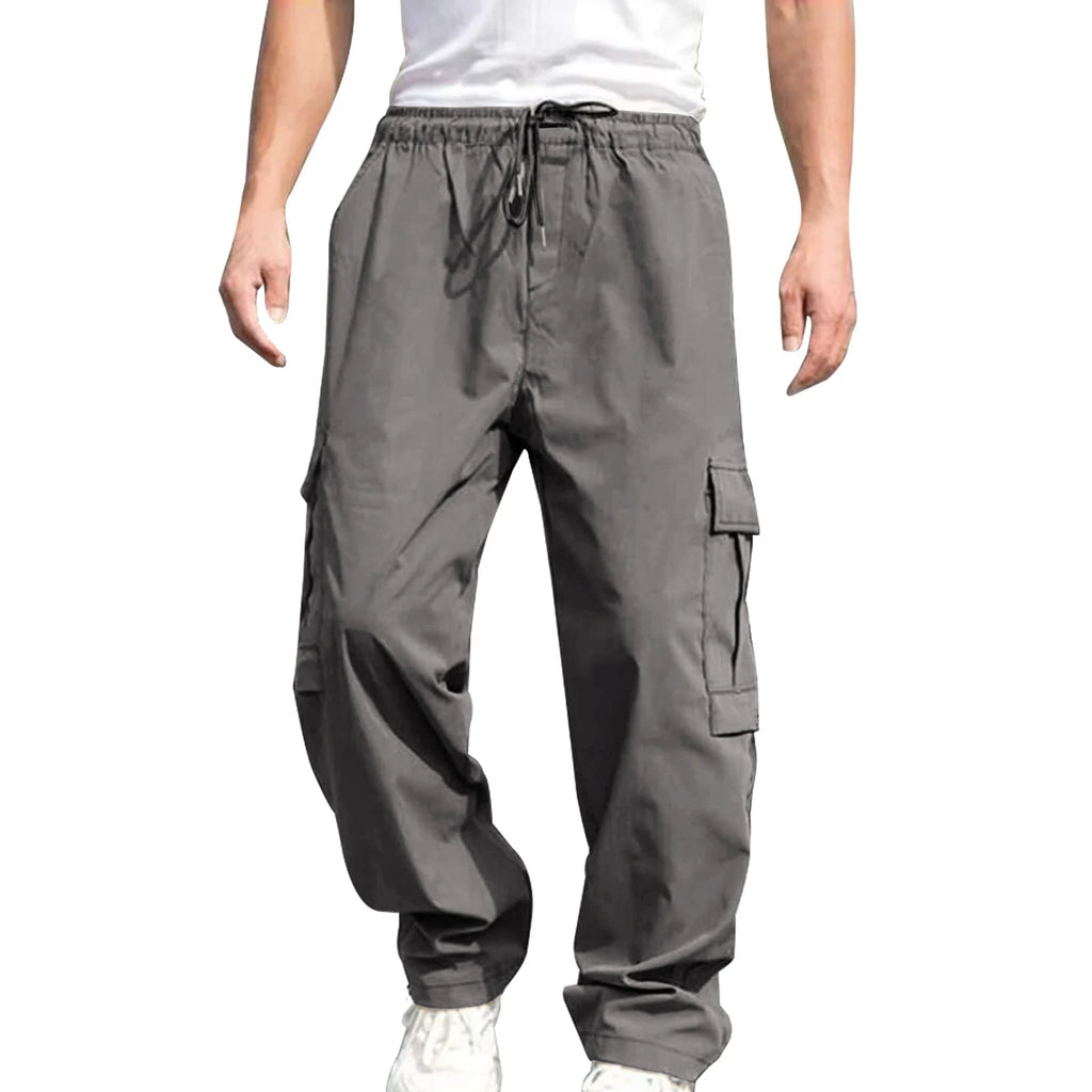 Men's loose cargo long pants from Your Outdoors n' More, featuring multiple pockets and comfortable fit, shown in a neutral color.