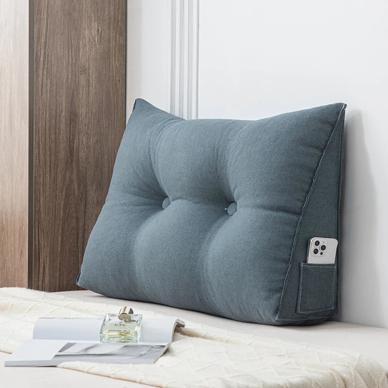 Small triangular wedge pillow with built-in massager from Your Outdoors n' More, designed for comfort and relaxation.
