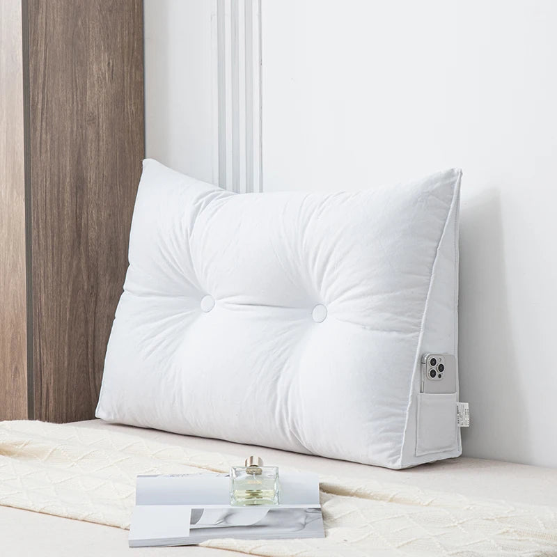 Small triangular wedge pillow with built-in massager from Your Outdoors n' More, designed for comfort and relaxation.