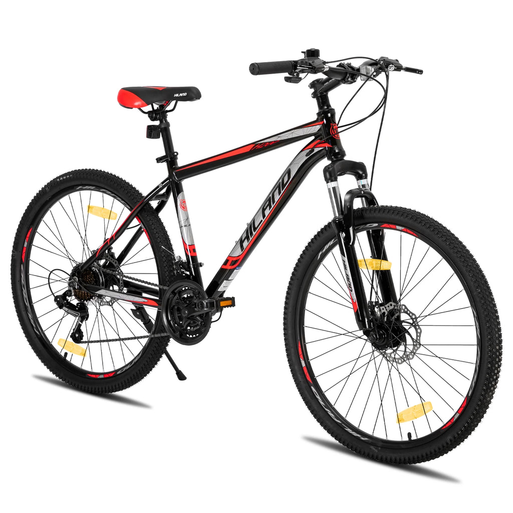 Mountain bike with Shimano 21-speed drivetrain and front suspension, designed for outdoor trail riding.