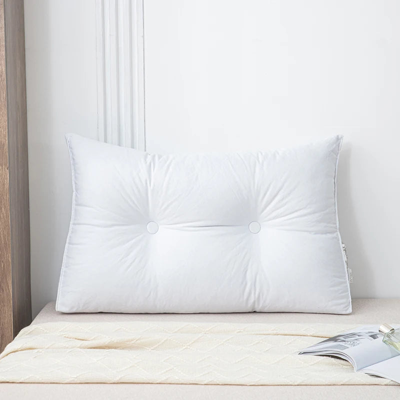 Small triangular wedge pillow with built-in massager from Your Outdoors n' More, designed for comfort and relaxation.